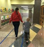 Westview student helper delivering Boomerang Bags 